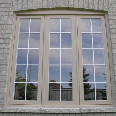 Beige Casement Windows Installed by Four Seasons Windows & Doors