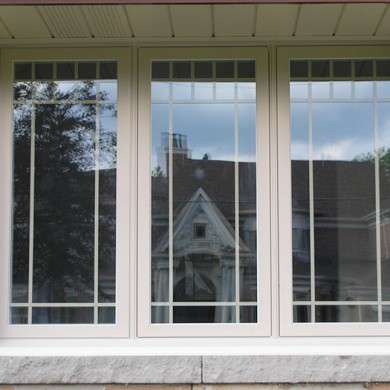 Hung Windows & Stained Glass Doors installation by Four Seasons Windows & Doors