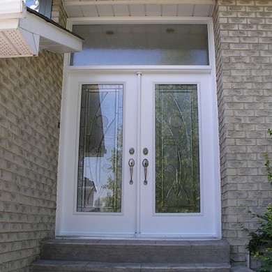 Stained Glass Front Door with Transom Installed by Four Seasons Windows & Doors