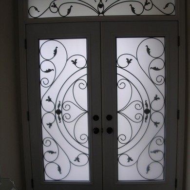 Wrought Iron Double Doors with Transom Installed by Four Seasons Windows & Doors-Inside View
