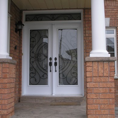 Wrought Iron Double Doors with Transom Installed by Four Seasons Windows & Doors in Richmond Hill-Out Side View