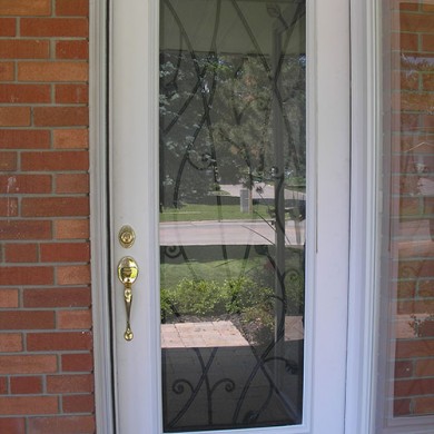 Wrought Ironn Door Installed by Four Seasons Windows & Doors